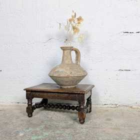 Repose-pieds en bois sculpté