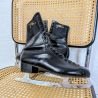 Patins à glace vintage Alain Giletti en cuir noir | l'Atelier Imparfait